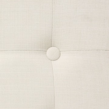 Detalle de tapizado beige claro con botón central y costura decorativa en relieve