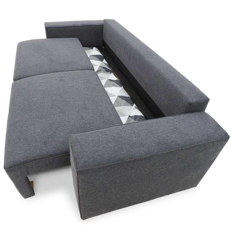 Sofá cama gris con asiento abierto mostrando estructura y mecanismo de almacenamiento interno vista superior