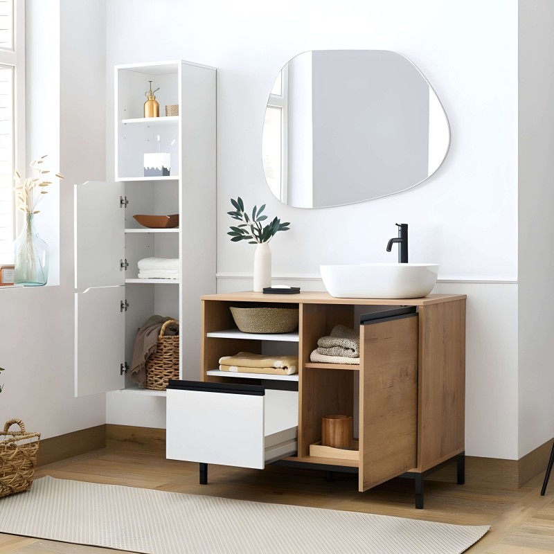 Mueble de baño madera natural y blanco con lavamanos redondo blanco y espejo ovalado en ambiente