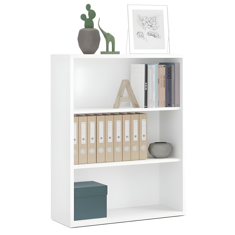 Estantería blanca de varios compartimentos con libros y cajas de almacenaje decorados