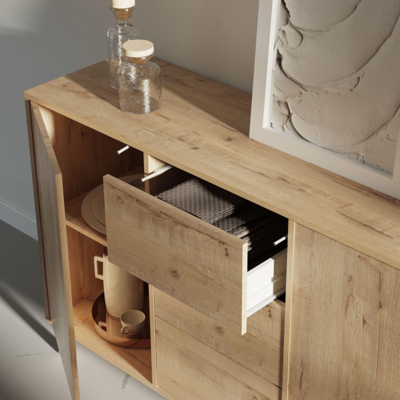 Mueble aparador de madera clara con cajón abierto y compartimentos con decoración minimalista
