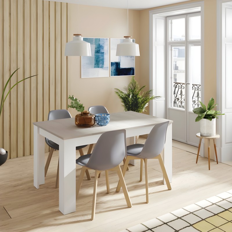 Comedor con mesa rectangular blanca y tapa gris y sillas grises con patas de madera natural en ambiente moderno