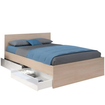 Cama con base de madera clara y cabecero tapizado beige con cajones de almacenamiento blancos y ropa de cama azul