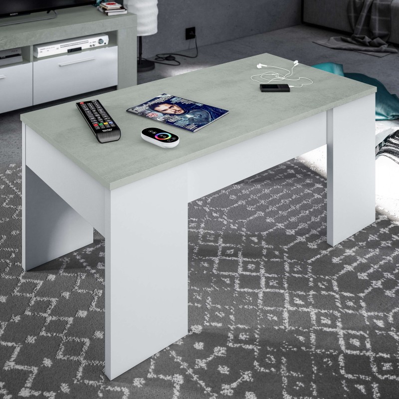 Mesa de centro rectangular con tablero gris claro y estructura blanca en salón moderno con accesorios electrónicos