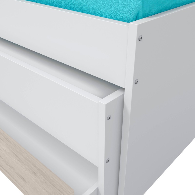 Cama con estructura blanca y cajones de almacenaje abiertos y colchón tapizado en turquesa