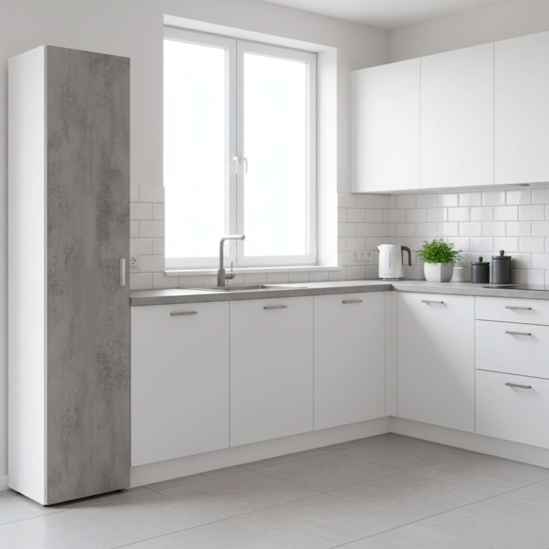 Cocina modular en L con muebles blancos y frente en hormigón gris y encimera oscura en ambiente