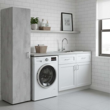 Mueble lavandería blanco con lavadora integrada y columna gris cemento en ambiente de baño