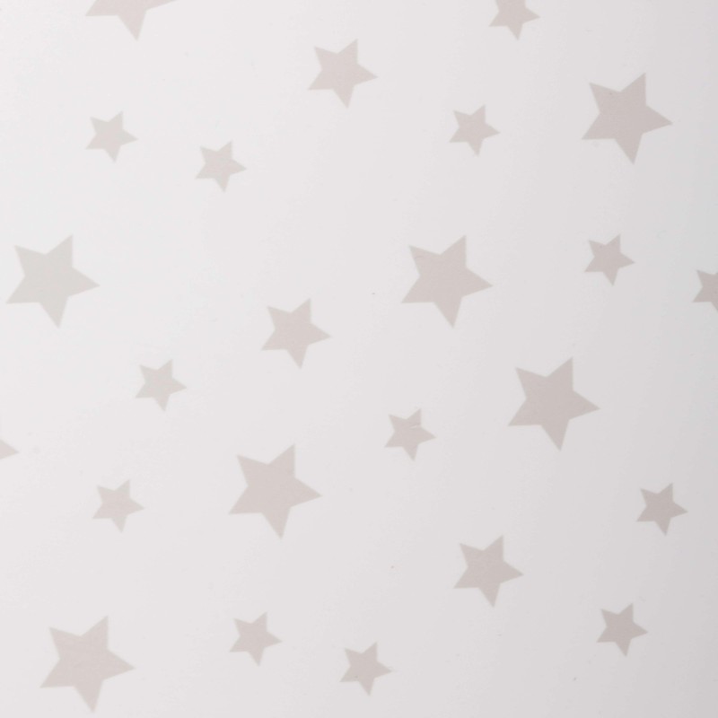 Detalle madera con patrón de estrellas beige y blanco para tapicería infantil