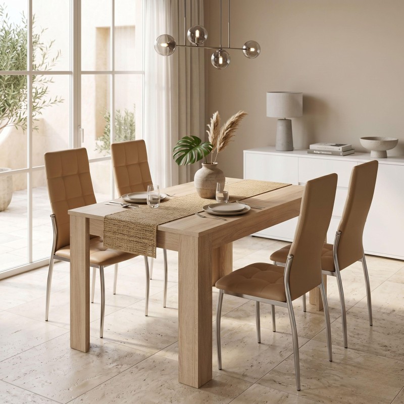 Comedor con mesa rectangular en madera clara y cuatro sillas tapizadas en marrón con patas metálicas en ambiente luminoso y mini