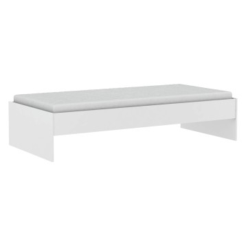 Cama individual blanca con estructura minimalista y colchón gris claro vista lateral