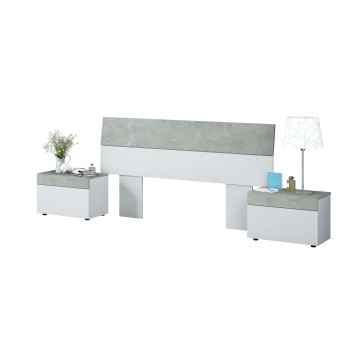 Cama matrimonial con cabecera bicolor gris y blanco y dos mesitas de noche a juego en ambiente