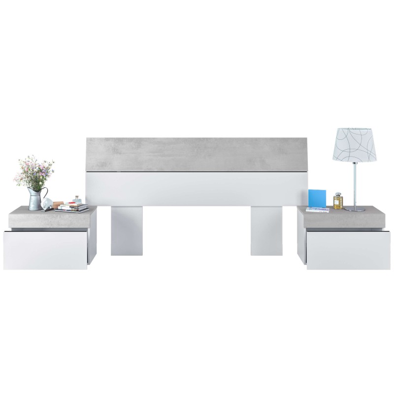 Cama matrimonial con cabecero gris y blanco y dos mesitas de noche a juego en ambiente