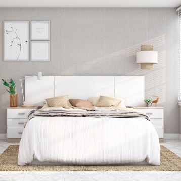 Cama con cabecero acolchado blanco y mesitas laterales en ambiente de dormitorio minimalista