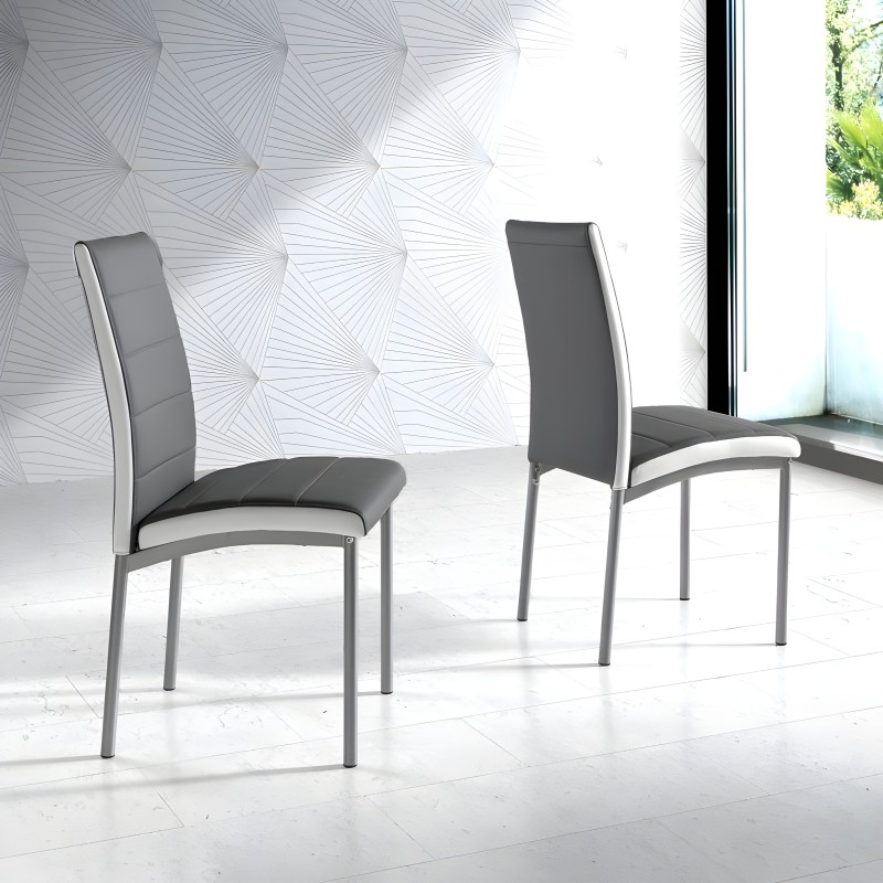 Sillas de comedor con respaldo alto en gris y blanco y estructura metálica en ambiente moderno