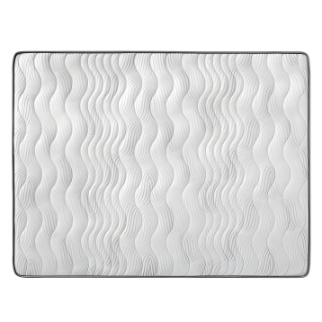 Colchón con superficie acolchada de ondas blancas y borde gris oscuro vista frontal