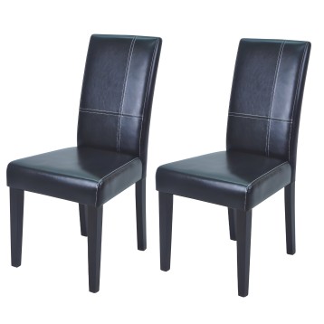 Pareja de sillas de comedor tapizadas en cuero negro con costuras decorativas y patas de madera oscura