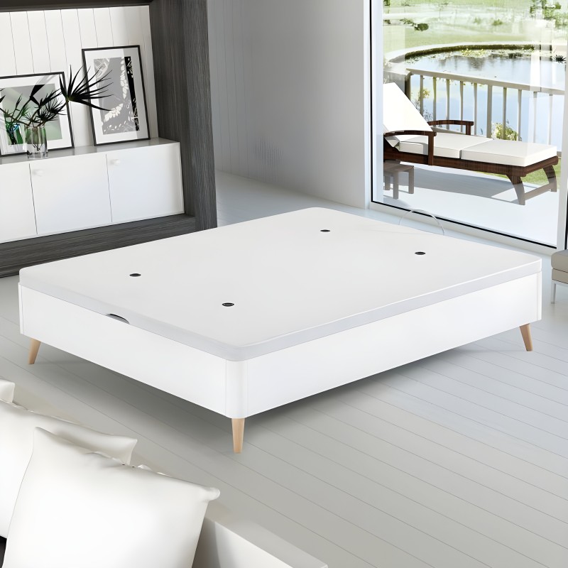 Canapé blanco con tapa acolchada y patas de madera clara en dormitorio moderno