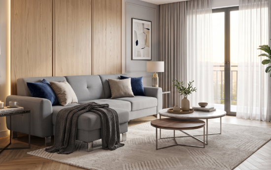 Salón moderno y luminoso con sofá chaise longue gris y mesa de centro